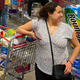Illustration for article titled Woman Tries To Spark Casual Chat In Long Grocery Store Line As If She Not Desperately Attempting To Outrun Death